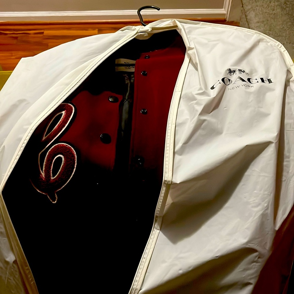 Women’s Coach letterman jacket gently worn size is a large.